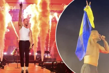 Imagine Dragons снова публично выразили поддержку Украине: на концерте в Милане вокалист поднял флаг, а сцену украсили сине-желтые ленты.
