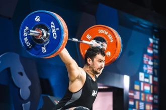 Молдавский тяжелоатлет Марин Робу завоевал бронзовую медаль на чемпионате мира в Норвегии, показав общий результат 369 кг.